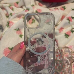 Clear Snowflake iPhone 15 case from velvet caviar